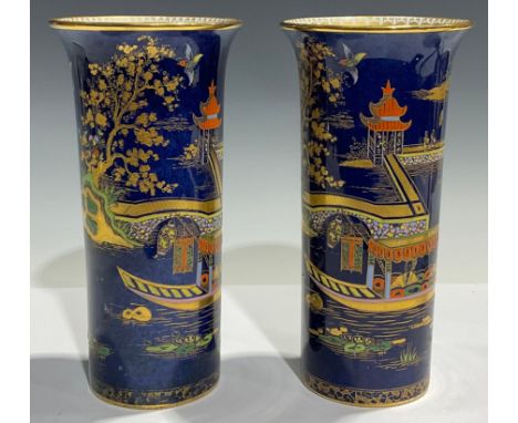 A pair of Carlton Ware Pagoda pattern lustre sleeve vases, 21cm high 