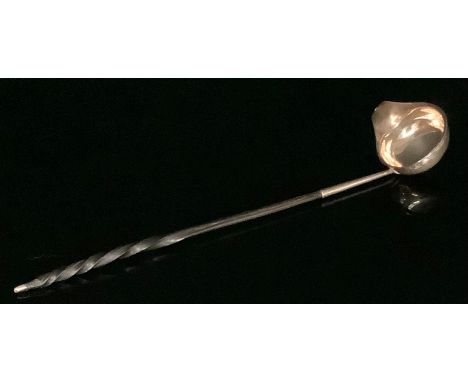 A George III silver toddy ladle, twisted baleen handle, London 1800, 34.5cm long, 40.8g gross 