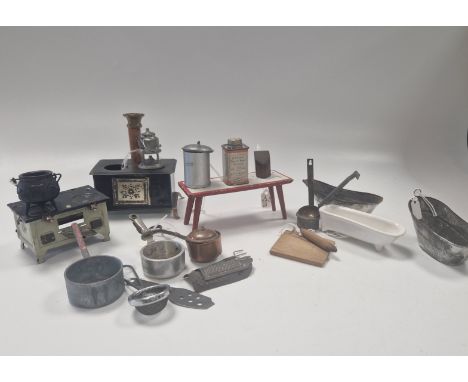 A mixed lot of dolls' house kitchenalia and bathroom items, to include a red and white tin plate table, 12.5cm wide; a miniat