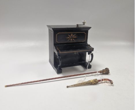 Attributed to Rock & Graner, a tin plate musical piano, black and gilt painted with operative musical mechanism, the lid open