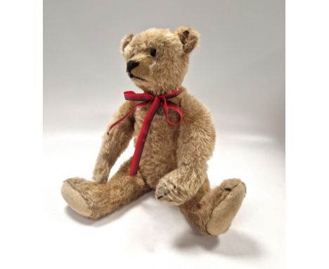 Steiff, an early 20th century teddy bear, circa 1910, a 5-way jointed bear in plush blonde mohair, pronounced hump to back, w
