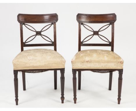 SET OF FOUR LATE GEORGIAN CARVED MAHOGANY SINGLE DINING CHAIRS, each with moulded top rail and fancy carved splat with flower