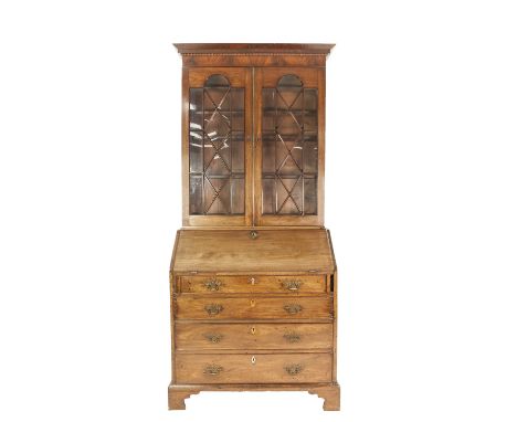 GEORGE III MAHOGANY BUREAU, with later bookcase top, the bureau of typical form with four graduated and cockbeaded drawers, a