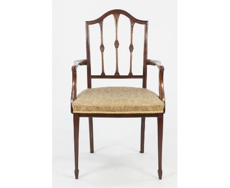 EDWARDIAN CARVED MAHOGANY CARVER ARMCHAIR, in the Sheraton style, the moulded back with arched top rail and three splats, eac