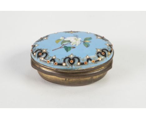 ANTIQUE ENAMELLED COPPER SMALL OVAL SNUFF BOX, the sky blue enamelled  hinged lid painted with a white floral sprig, the dark