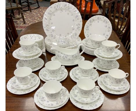 Wedgwood April Flowers dinner service for eight comprised of; ten dinner plates, eight medium, ten side plates, ten tea cups 