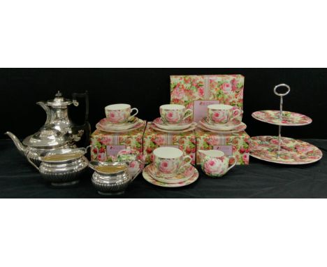 Maxwell Williams Rambling Roses tea ware including; four floral tea cups and saucers, four side plates, cake stand, sugar bow