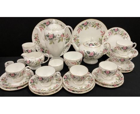 Wedgwood Hathaway Rose tea service for six including; a tea pot, a coffee pot, six tea cups and saucers, side plates; etc