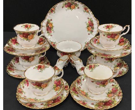 Royal Albert Old Countryroses tea ware comprised of; a picnic plate, sugar bowl, six tea cups and saucers, six side plates, p