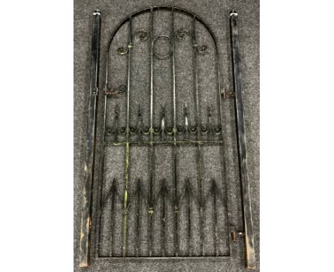 An archtop wrought iron garden gate, 188cm high x 82cm wide.
