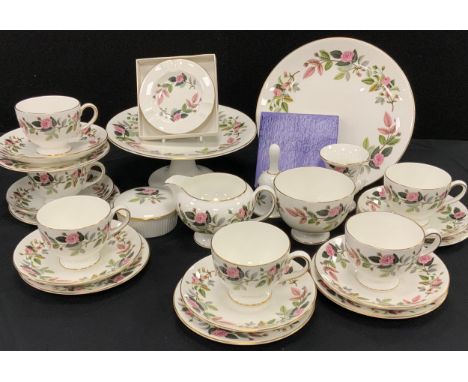 Wedgwood Hathaway Rose pattern including; six tea cup and saucers, milk jug, sugar bowl, bell, trinket box, cake stand; etc.