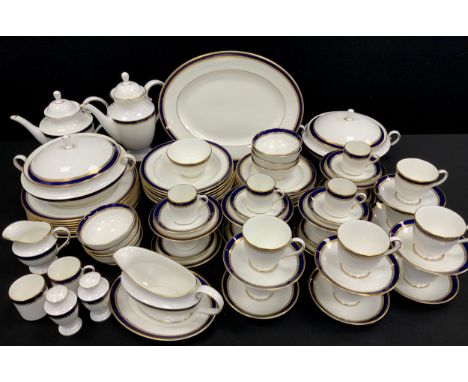 A Royal Grafton cobalt blue and gilt table service for eight including; a coffee pot, tea pot, eight dinner plates, eight sma