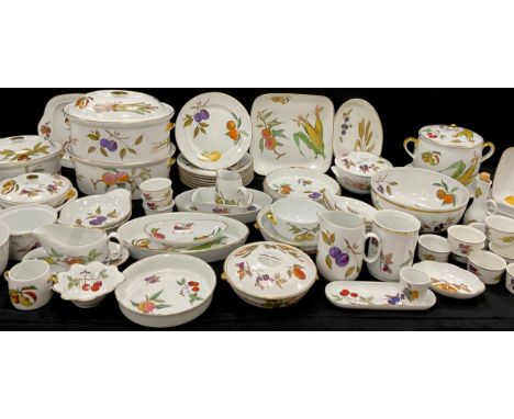 Royal Worcester Evesham pattern kitchen and dinner ware including; eight dinner plates, lidded tureens, oven dishes, ramekins