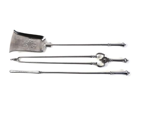 A set of English steel fire tools, first half 19th century, comprising shovel, poker and tongs, cast with faceted grips, the 