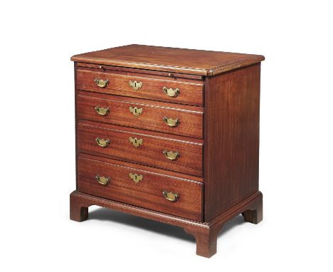 A George III mahogany chest of drawers, circa 1780, the rectangular top with moulded edge, above a brushing slide and four lo