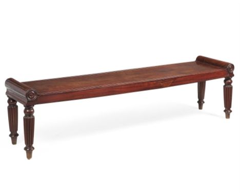 A Regency mahogany hall bench, circa 1815, in the manner of Marsh & Tatham, the moulded rectangular top with raised and round