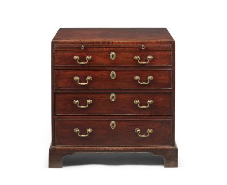A George III mahogany chest of drawers, circa 1780, the rectangular caddie top with moulded edge, above a brushing slide and 