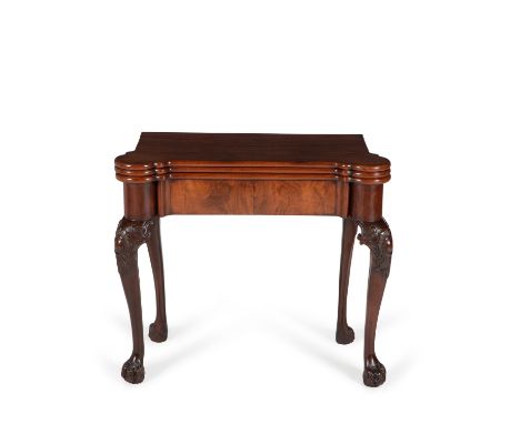 A George III mahogany triple folding games and tea table, circa 1760, the triple hinged 'eared' top opening once to a plain s