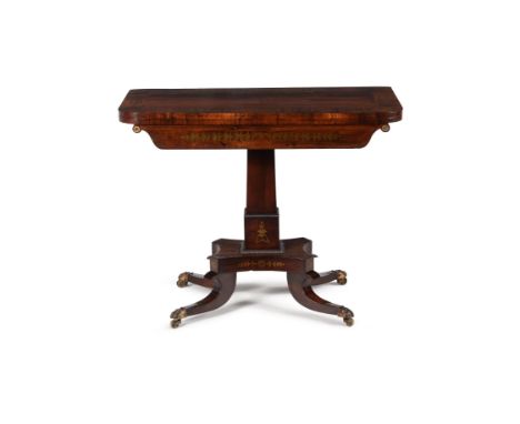 Y A Regency rosewood and brass marquetry card table, circa 1820, with foliate brass inlay throughout, the hinged rectangular 