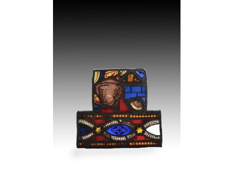 Two stained glass architectural composite fragments, probably 15th century, possibly French, comprising one rectangular compo