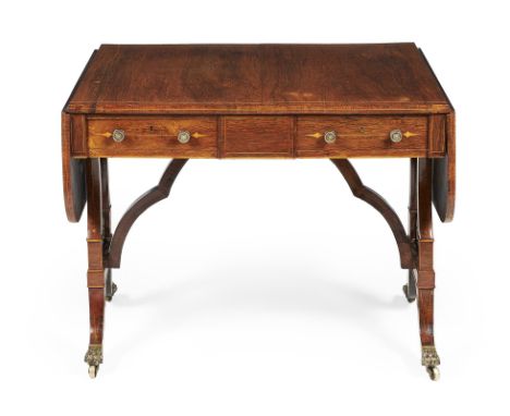 Y A Regency rosewood, inlaid and brass mounted sofa table, circa 1815, in the manner of John McLean, the rectangular twin fla