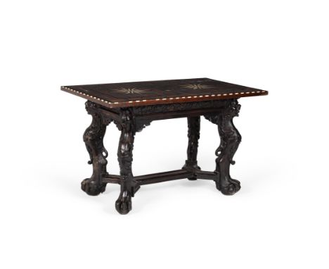 Y A Continental carved walnut, rosewood, ebony and ivory parquetry centre table,  17th century and later, the rectangular top