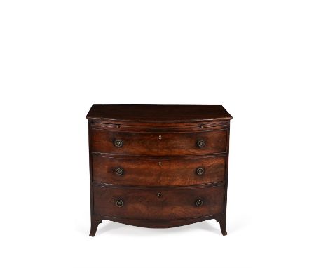 A George III mahogany bowfront chest of drawers, circa 1800, the shaped top with moulded edge, above a brushing slide, three 