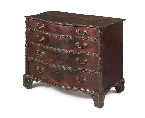 A George II mahogany serpentine dressing chest of drawers, circa 1755, the shaped top with moulded edge, above four long grad