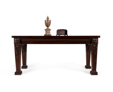 A mahogany serving table in George III style, circa 1890, the rectangular top above the acanthus carved frieze finished on al