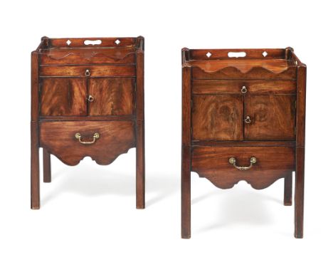 A matched pair of George III mahogany bedside commodes, circa 1780, in the manner of Thomas Chippendale, each rectangular top