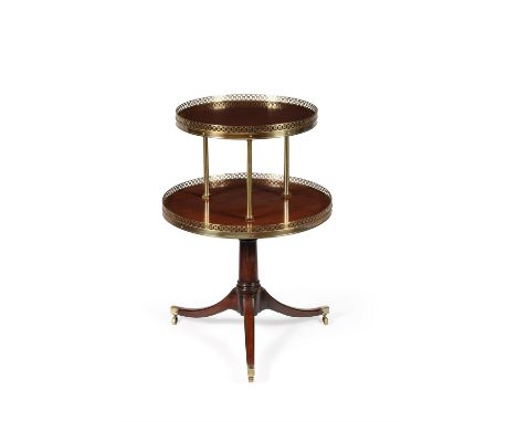 A Regency mahogany and brass mounted two tier dumb waiter, circa 1815, attributed to Gillows, each graduated circular tier jo