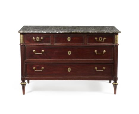 A Directoire mahogany and giltmetal mounted commode, late 18th century, the rectangular variegated grey marble top with round