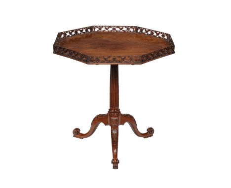 A George III mahogany tripod table, circa 1760, in the manner of Thomas Chippendale, the octagonal top with pierced gallery, 