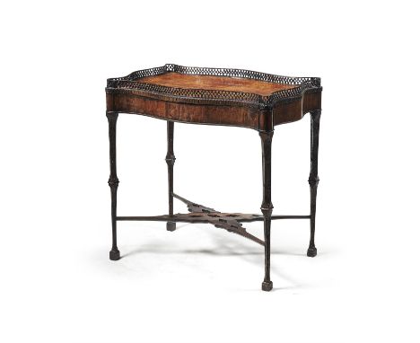 A George III mahogany table silver table, circa 1760, in the manner of Thomas Chippendale, the serpentine shaped top with pie