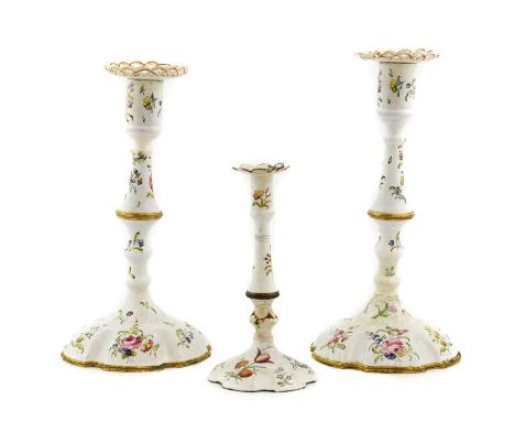 A Pair of South Staffordshire Enamel Candlesticks, circa 1770, with pierced detachable drip pans, cylindrical sockets, knoppe