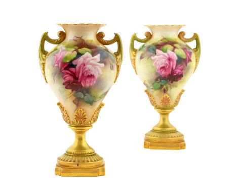 A Pair of Royal Worcester Porcelain Twin-Handled Vases, by Reginald Austin, circa 1911, of baluster form, painted with sprays