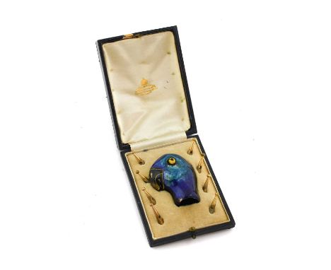 An Enamel Parasol Handle, early 20th century, in the form of the head of a parrot, with turquoise and blue plumage5cm highEig