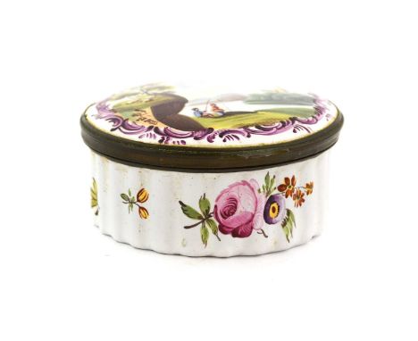 A South Staffordshire Enamel Patch Box and Cover, late 18th century, inscribed in gilt A Trifle from Bath on a blue panel wit