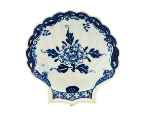 A Lowestoft Porcelain Shell-Shaped Pickle Dish, circa 1770, painted in underglaze blue with a central peony within a scroll a