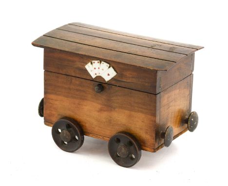 A Late Victorian Olivewood Novelty Playing Card Box, in the form of a railway truck, the hinged cover with planked top and fo