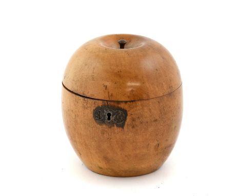 A Turned Fruitwood Apple Tea Caddy, early 19th century, with hinged cover and white metal escutcheon13cm highThe top is sligh