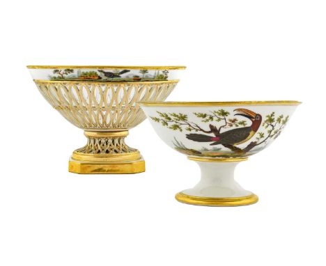 A Paris Porcelain Pedestal Basket, circa 1800, of oval form, painted with birds in landscape over a moulded, gilt and pierced