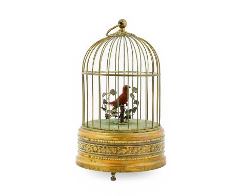 A Clockwork Automaton Singing Bird in Cage, late 19th/early 20th century, the red-plumed bird perched on a branch within a wi
