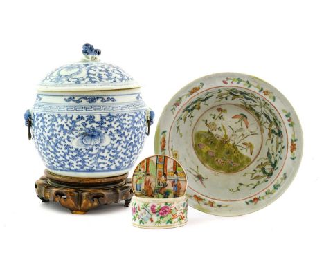 A Cantonese Porcelain Basin, 19th century, of circular form with ogee rim, painted in famille rose enamels with insects among