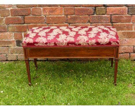 An Edwardian Mahogany Double Piano Stool, on tapered legs with box wood inlay, approx 85 x 39 cms.