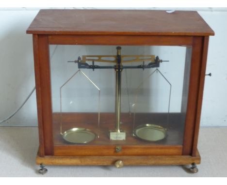 A Set of Scientific Scales, together with Baird and Matlock of London weights.