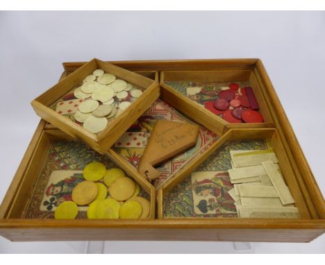 N K Atlas Paris Vintage Game, in the original box together with a hand carved miniature pan flute dated 1914.