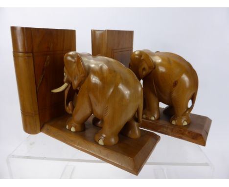 A Pair of Light Wood Hand Carved Elephant Book Ends.