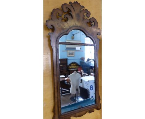 An Antique Chippendale Style Walnut Veneer Mirror, the mirror having a plumed top with carved surround, approx 99 x 55 cms