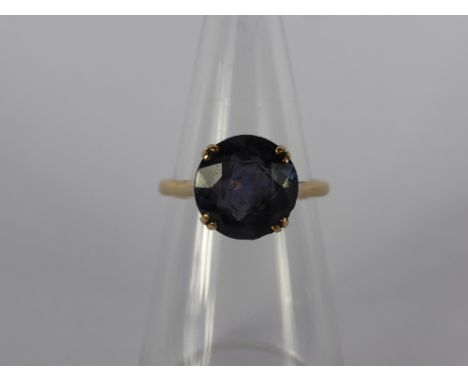 A Lady's 9 Ct Gold Amethyst Ring, size T, approx wt 4.2 gms together with a silver marquisette and emerald ring, size T.